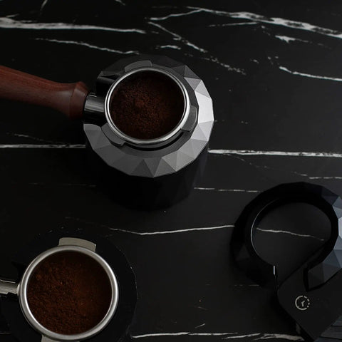 Coffee Portafilter Holder And Espresso Tamper Stand with 58mm portafilter, on a black marble countertop