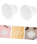 Anchor-Shape LED Strip Clips White Plastic Mounting Brackets for LED Light Strips, shown in piles on various surfaces