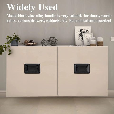 Room interior with cabinets featuring Concealed Recessed Pull Handle In Black Zinc Alloy Flush Mount Hidden Door Hardware 95mm by 60mm.
