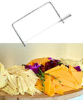 Six Inch Cheese Slicer Kit Crafted From Durable Stainless Steel And Polished Copper Comes With Four Extra Wires For Legit Smooth Cuts A Totally Slick Upgrade Any Serious Kitchen Deserves Now with assorted cheeses and fruits.