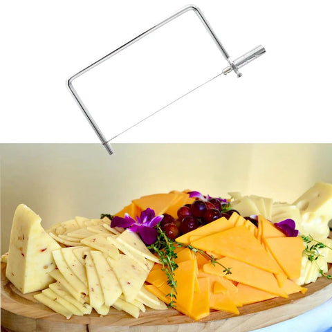 Heavy Duty Block Cheese Slicer Replacement Kit With Six Inch Stainless Steel Blades Brass Enhanced Handle Four Piece Set on a cheese platter.
