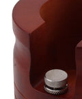 Close-up of the precision slot on the solid wood red portafilter holder stand, designed for espresso tamping, fits 51mm and 54mm filters.