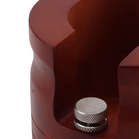Close-up of the precision slot on the solid wood red portafilter holder stand, designed for espresso tamping, fits 51mm and 54mm filters.