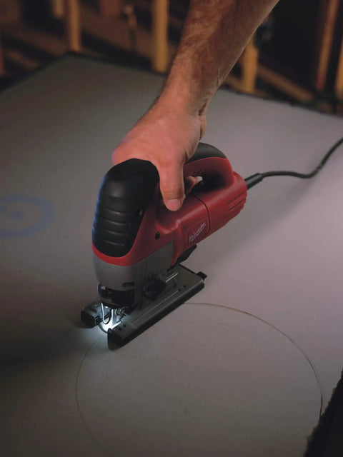Top Notch 6.2 Amp Orbital Jig Saw Boasting Tool Free Blade Swap And Seven Setting Speed Dial For Sharp Clean Cuts On Any Drywall Or Lumber Gig You Roll With Today in use on a sheet of drywall.