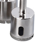 Jiawu 15 Piece Universal Hole Saw Kit With Emery Drill Bits For Cutting Ceramic Tiles Glass And Hard Surfaces Effortlessly Made Simple, close-up of diamond-coated hole saw bit