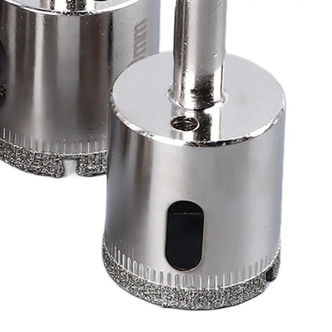 Jiawu 15 Piece Universal Hole Saw Kit With Emery Drill Bits For Cutting Ceramic Tiles Glass And Hard Surfaces Effortlessly Made Simple, close-up of diamond-coated hole saw bit