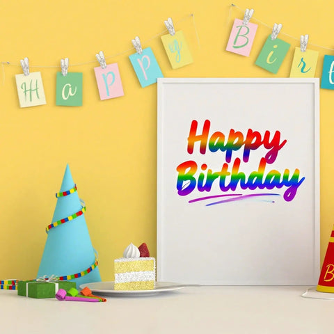 Birthday party setup with rainbow "Happy Birthday" sign, cake slice, gift, hat, and banner using Heavy Duty Balloon Arch Clip Set