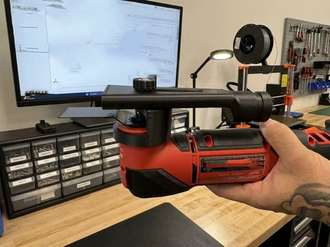 Oscillating Tool Dust Collection Attachment With Adjustable Depth Stop Guide Dual Function Accessory on red oscillating tool in workshop