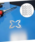 144 Piece Auto Body Shims Kit With Steel Slotted Washer Spacers For Precise Panel Alignment And Noise Reduction Pro Grade Gear For DIYers And Pros In Auto Shops Works On Sheet Metal Panels steel slotted shims on blue surface