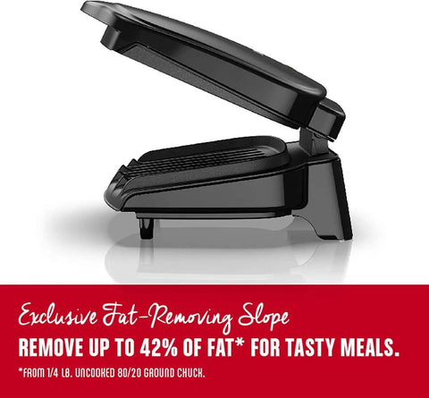 Compact Space Saver Two Serving Grill And Panini Press with open lid showing nonstick surface and fat-removing slope.