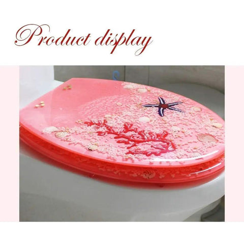 Heavy Duty Slow Close Toilet Seat Cover Top Shelf Crystal Resin U Shape on toilet with decorative shells and starfish design.