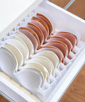 Six Piece Clear Plastic Bra Storage Box With Dividers For Wardrobe Closet Drawer Organization, displaying neatly organized bras in a drawer.