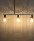 Modern 3 Light Indoor Hanging Kitchen Island Light With Brushed Nickel Finish And 5.3 Inch Clear Glass Shades lit up