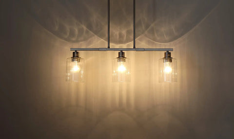 Modern 3 Light Indoor Hanging Kitchen Island Light With Brushed Nickel Finish And 5.3 Inch Clear Glass Shades lit up
