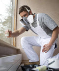 Man wearing Reusable Half Face Mask With Glasses For Gas Dust Paint Car Spraying And Organic Vapors Pro Grade Filter Cotton painting