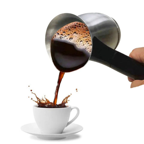 Pouring coffee from 600W Electric Coffee Maker With 600ML Capacity For Turkish And Greek Coffee Tea And Milk Stainless Steel Coffee Pot