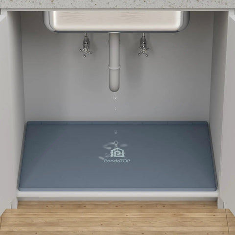 Silicone 28x22 Inch Under Sink Tray, Waterproof Flexible Cabinet Liner for kitchen bathroom and laundry shown under sink with drip