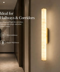 JCQASRT 19.69 in Modern Wall Sconce, 3-Color Changing LED Wall Light Fixture, Hardwired Brass Gold Metal & Resin Wall Lamp for Bedroom Living Room Hallway Staircase illuminating a corridor.