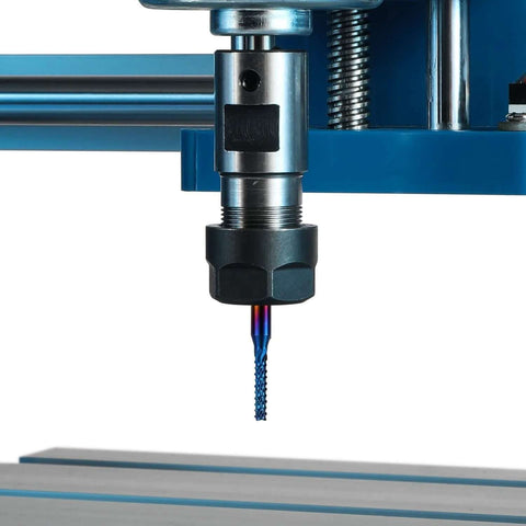 Close-up of Genmitsu CNC router end mill with 1/8 in shank installed in spindle, blue-coated bit