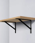 Heavy Duty Shelf Brackets 12 x 8 Inch Black Metal L Angle Brackets With Screws 10 Pack supporting wooden shelf