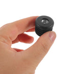 Round Furniture Glide Caps With M8 Thread For Chair Legs Plastic And Metal Stoppers held in hand, black color