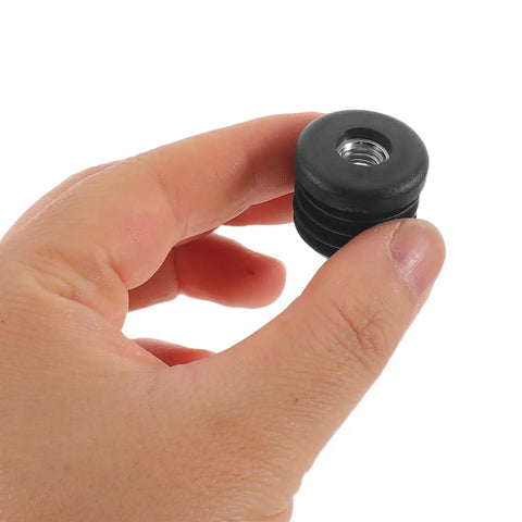 Person holding a Round Plastic Tube End Caps For Furniture Legs 20 Pcs, Flexible PE And Metal Plugs with secure lock in hand.