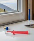 Heavy Duty Insulated Wire Stripper Knife With No Sweat Cable Cutting Razor Ergonomic Grip Handle on a work surface.