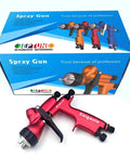 Heavy Duty Pneumatic Spray Gun For Automotive Paint And Bodywork Topcoats Featuring High Atomization Build Top Loading 600 ML Cup Knockout Finish Straight Fire set against packaging.