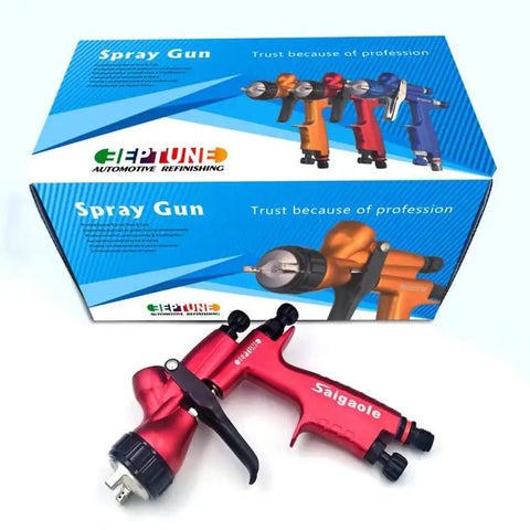 Heavy Duty Pneumatic Spray Gun For Automotive Paint And Bodywork Topcoats Featuring High Atomization Build Top Loading 600 ML Cup Knockout Finish Straight Fire set against packaging.