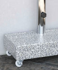 Built Tough Heavy Duty Patio Umbrella Base With Wheels And Adapters Granite Parasol Base close-up showing granite texture and wheels