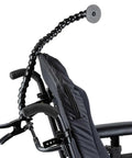 Assistive Tech Spring Clamp Kit with 24 inch flexible hose arm attached to a wheelchair, one clamp and one disc visible