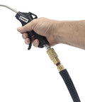 Hand holding Four Pack Pistol Grip Air Blow Gun With Lightweight Non Slip Composite Handle For Dust Cleanup In Tight Corners