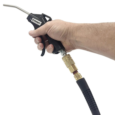 Hand holding Four Pack Pistol Grip Air Blow Gun With Lightweight Non Slip Composite Handle For Dust Cleanup In Tight Corners