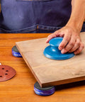 Person using 2 Piece Sanding Block Set For 5 Inch Hook And Loop Discs Durable And Versatile For Softening Edges Detail Sanding