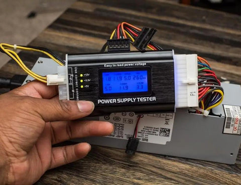 Your Go-To 8-In-1 Power Supply Tester For PC Builds With ATX 20-24 Pin, IDE HDD SATA, PCIe 6-Pin, EPS 8-Pin, Floppy 4-Pin, in use.