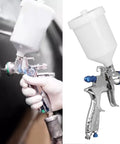 Top Shelf Aluminum Alloy Pneumatic Paint Sprayer With 1.4mm Nozzle built to last for auto body work, held in hand.