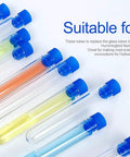 Colorful test tubes with blue caps suitable for mad-scientist experiments, placed on white background.
