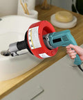 Heavy Duty Electric Drain Auger Sewer Snake With 26 Foot Spring Steel Cable clearing a sink blockage with a 700W motor.