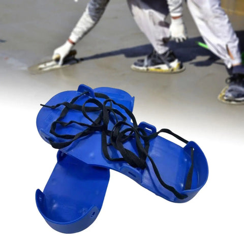Blue durable PP material lawn aerator shoes for aerating lawns and epoxy flooring, shown with black straps.