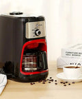 Bean To Cup Coffee Maker Featuring Built In Grinder And 600Ml Glass Carafe with black and red design on kitchen counter