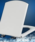 White Soft Close Toilet Seat Featuring Quick Release And Adjustable Top Mount Hinges smooth finish floating above watery background.