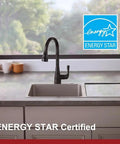 Compact 3 In 1 In Sink Dishwasher With Build In Produce Washer And Pasteurizer Boasting 360 Degree Rotary Spray, sleek black faucet in modern kitchen.