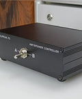 2 In 1 Out Amp And Speaker Switcher For Dual Amps Or Dual Speakers Reversible with banana jacks, front view on desk