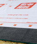 Top Shelf Shingle Underlayment Super Smooth Polypropylene Roofing Paper 4 Ft By 250 Ft Roll with nail guide and overlap line.