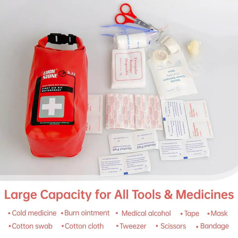 Must Have Waterproof Emergency Kit For Boating And Outdoor Adventures with first-aid contents including scissors, tape, and bandages displayed