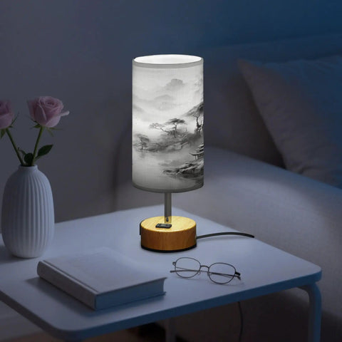 Mountain Watercolor Bedside Table Lamp With 3-Way Dimmable Touch Control And Built-In Charging Station on a nightstand
