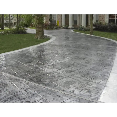 Kickass High Gloss Concrete And Masonry Sealer offering a bold wet look finish on a stamped concrete driveway.