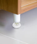Close-up of a suction cup from a Ten Piece Screw On Glide Set With Suction Cups That Keep Your Sofas And Tables Stay Put on flooring