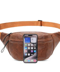 Lightweight PU Leather Fanny Pack Purse for Women, Trendy Crossbody Shoulder Bag with Coin Zip Pocket shown with phone size reference