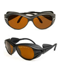 Top Notch Laser Safety Glasses Featuring Killer OD5+ Protection Shielding Eyes From Harmful UV Blue Green And YAG Rays Unisex Fit, durable rubber frame, brown lenses.